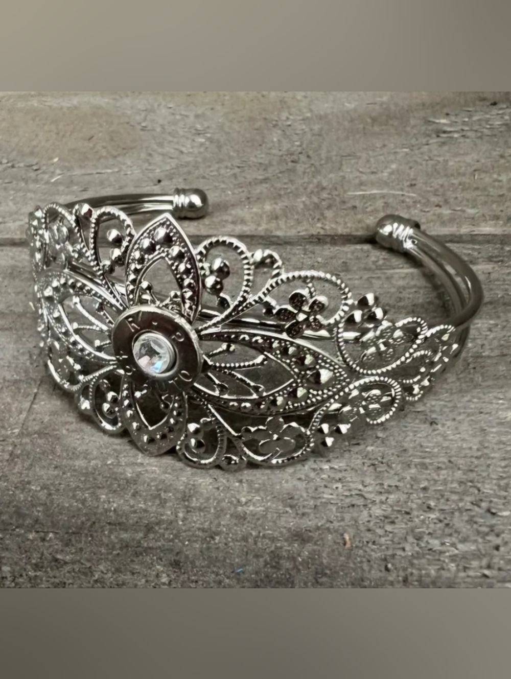 Silver Filigree Flower Cuff Bracelet with Bullet Crystal Accent